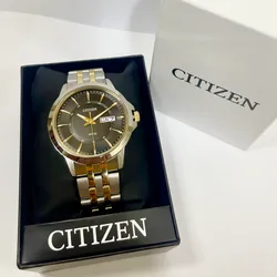 Citizen Doble Tono Negro y Dorado de Cuarzo