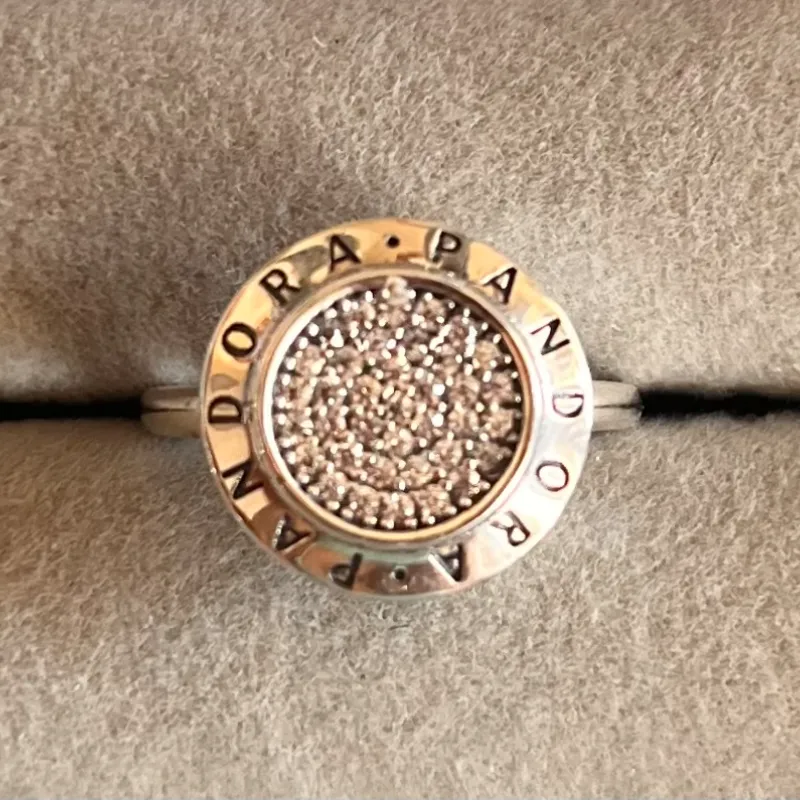 Anillo logo plateado