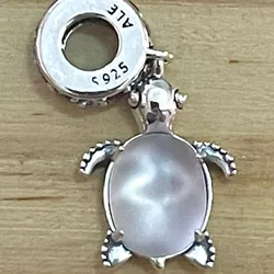 Charm Tortuga rosada clara 