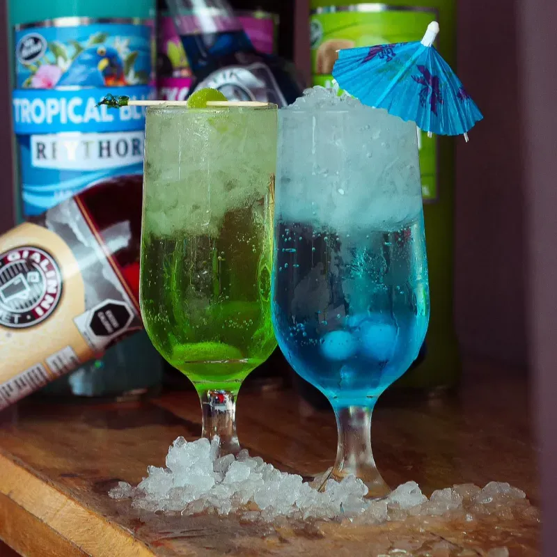 Mocktails de Arándano, Cereza, Dragón Fruit, Durazno, Frambuesa, Fruta de la Pasión, Granny Apple Manzana Verde, Hawaiian Island, Lima Limón y Mora Azul