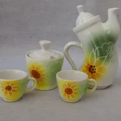 Juego de dos tazas, azucarero y tetera