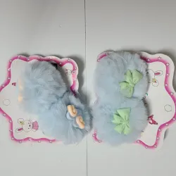 Pareja de pompones en hebilla 