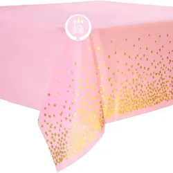 Mantel rosado con lunares dorados