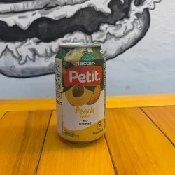Jugo de lata de melocotón