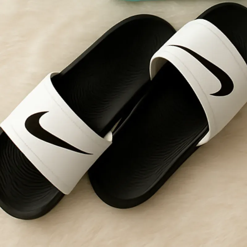 Chancletas de baño Nike blancas 