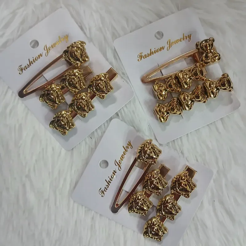 Set de hebillas doradas