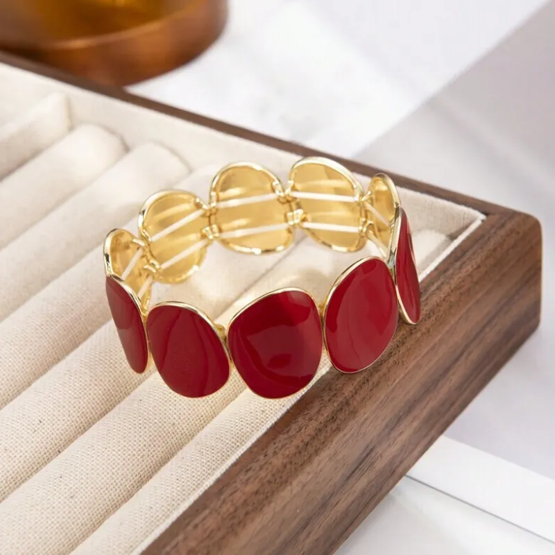 Pulsera roja y dorada 