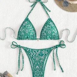 Bikini verde dibujos blancos