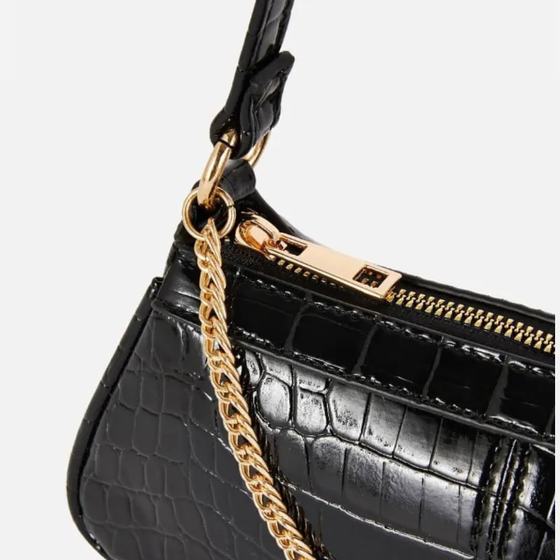 Bolso bandolera extra brillante cadena dorada 