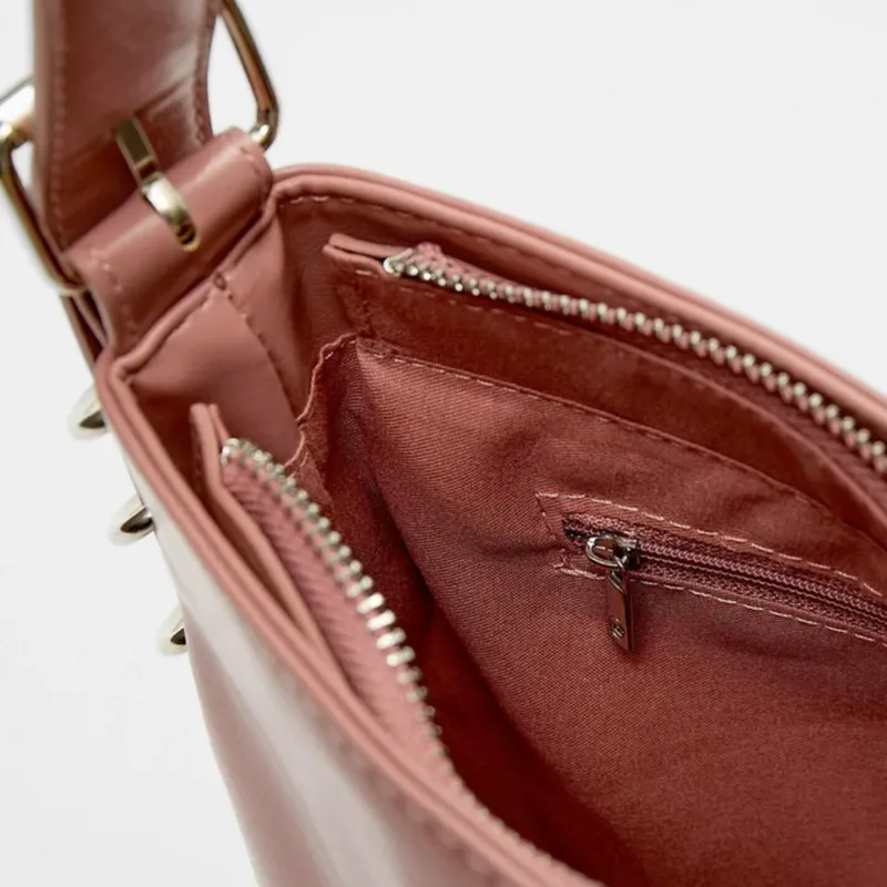 Bolso con asa ajustable rosa 
