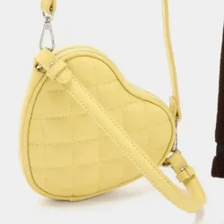 Bolso pequeño amarillo en forma de corazón