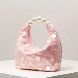 Bolso rosado con perlas