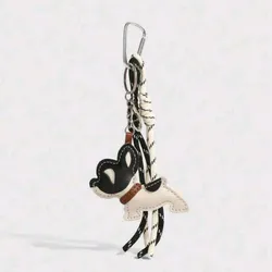 Charm de mascota blanco y negro 