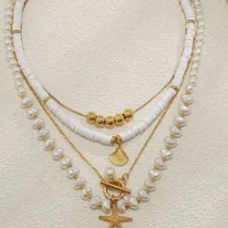 Conjunto de collares blanco y dorado