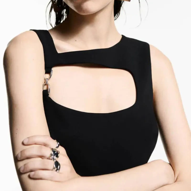 Mono negro detalle plateado