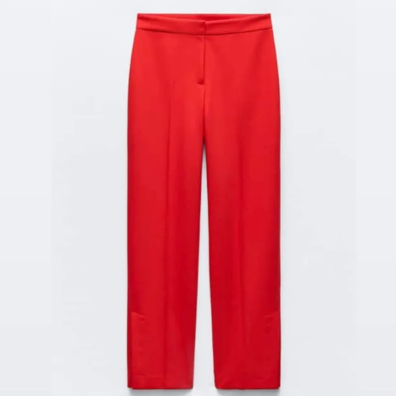 Pantalón recto bajo aberturas 