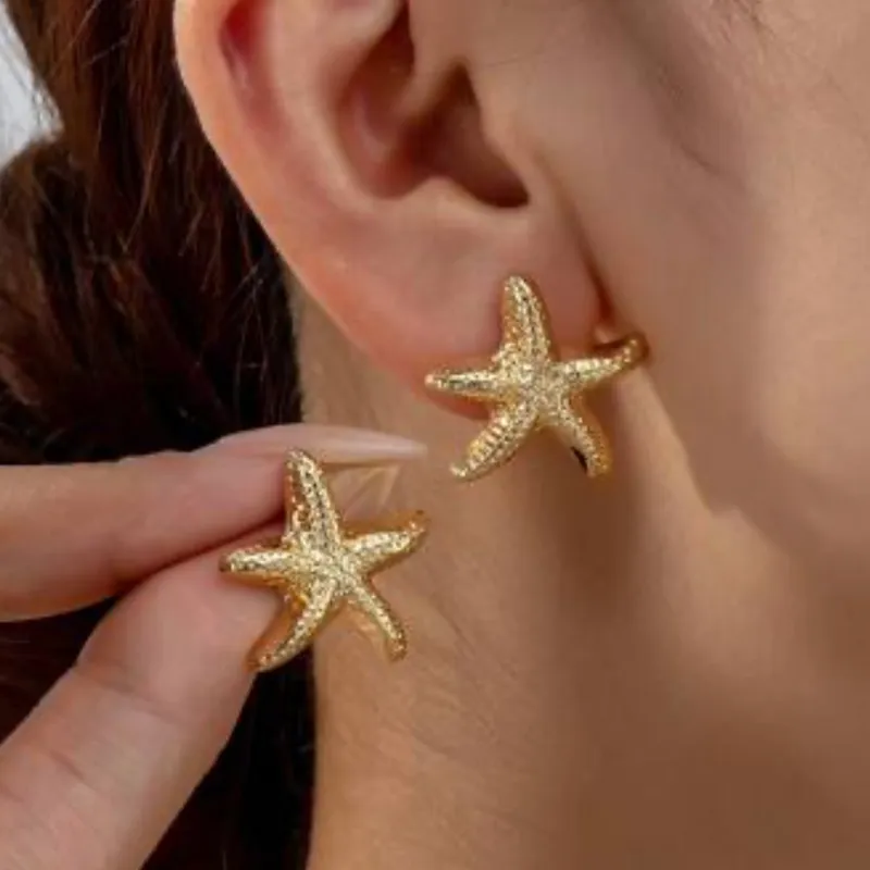Pendientes de estrella dorados 