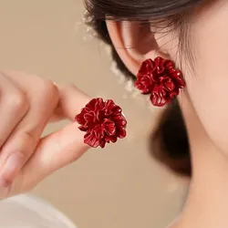 Pendientes de flor rojos