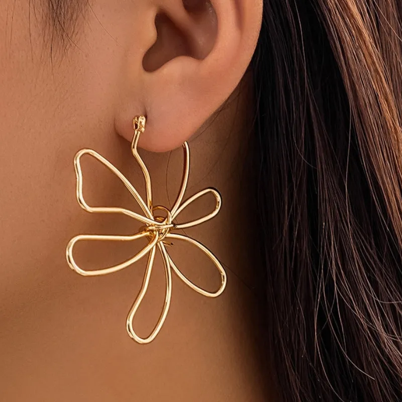 Pendientes de flores dorado