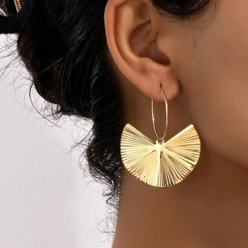 Pendientes dorados de alas