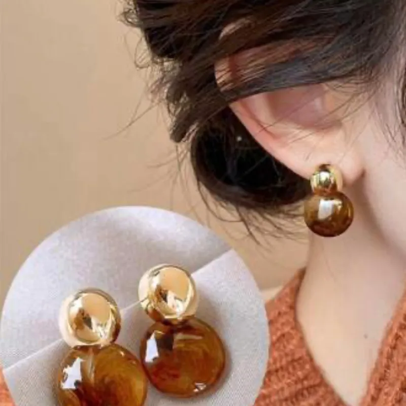 Pendientes redondos carmelitas 