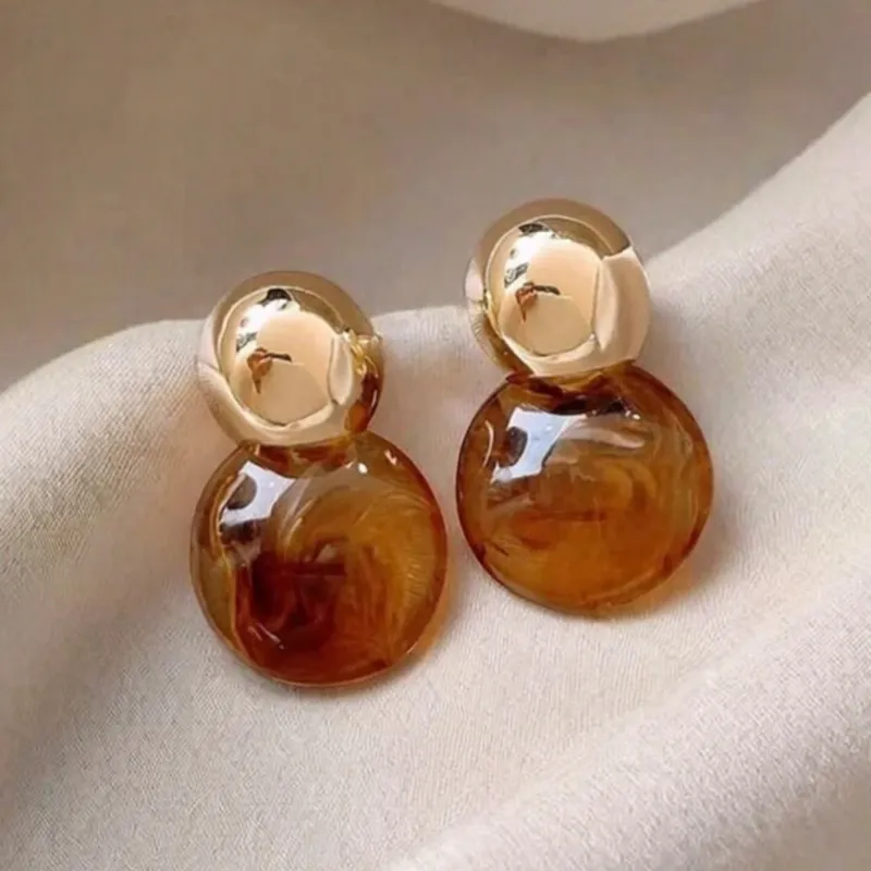 Pendientes redondos carmelitas 