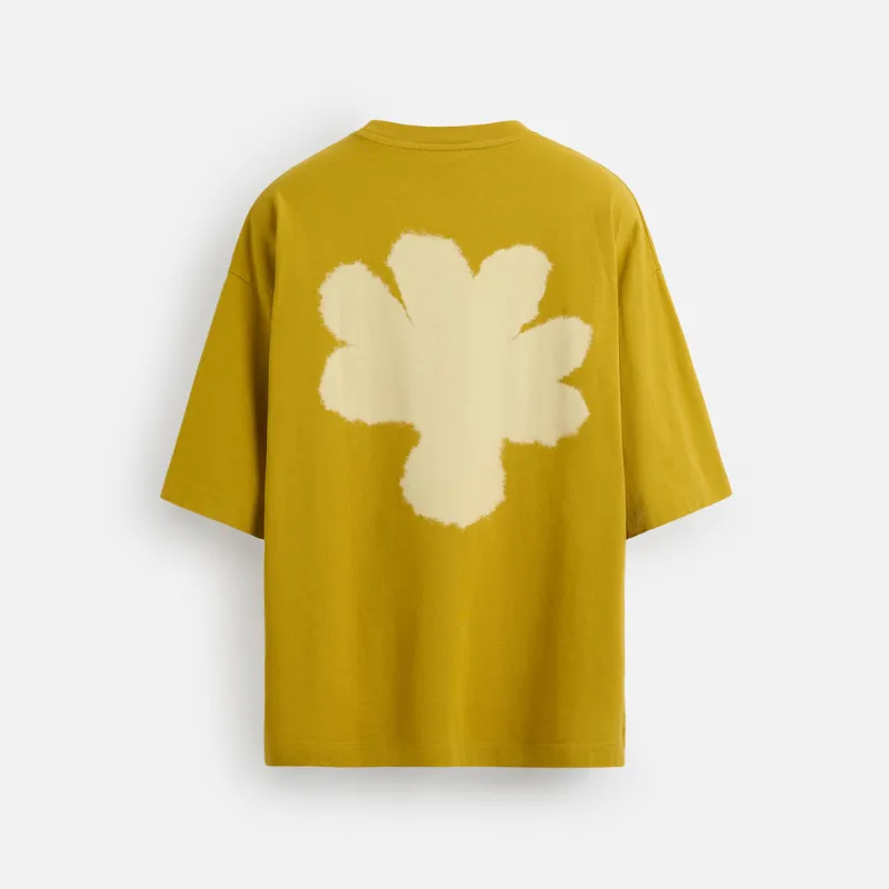 Pullover mostaza con flor