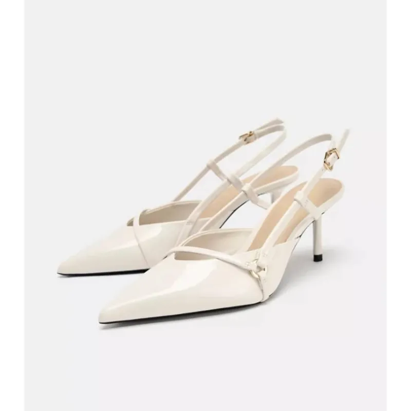 Puntifinos blancos detalles dorados