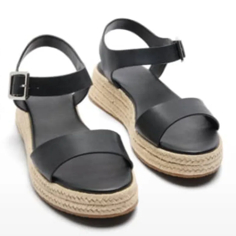 Sandalias negras con suela de saco