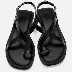 Sandalias negras cruzadas 