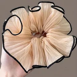 Scrunchie beige borde negro