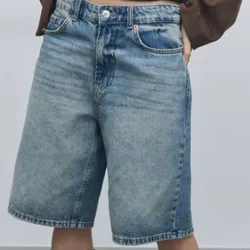 Short largo mezclilla gastada