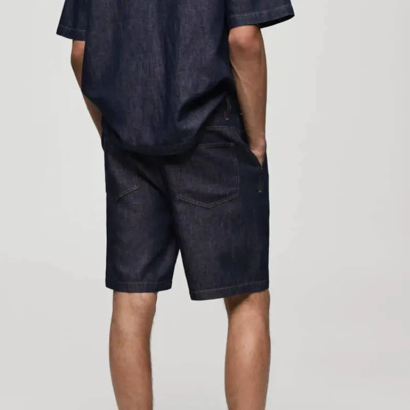 Short mezclilla de pinzas 