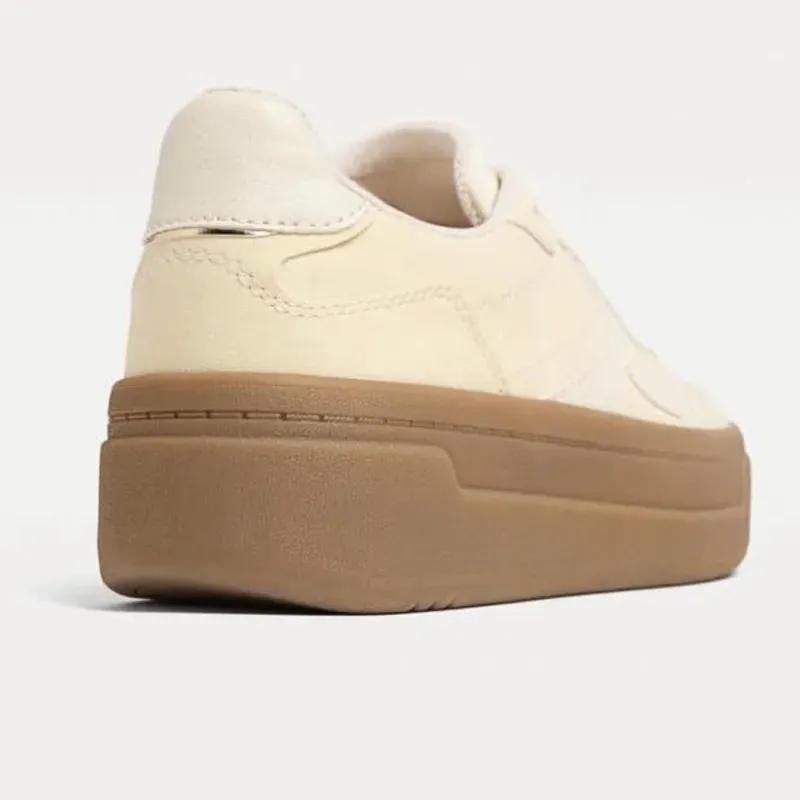 Tenis amarillo y blanco