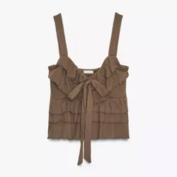 Top con lazo y vuelos