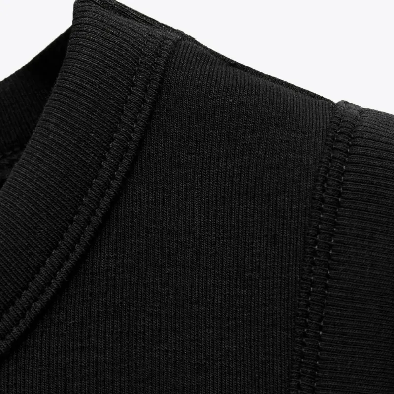 Top entallado de cuello redondo y manga sisa
