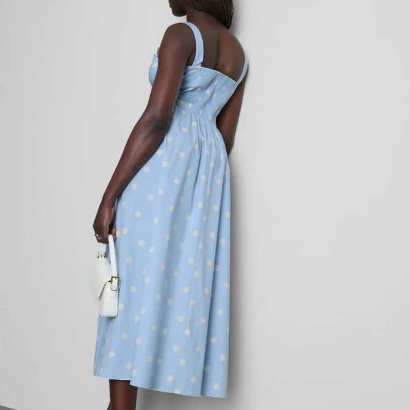 Vestido azul de puntos blancos