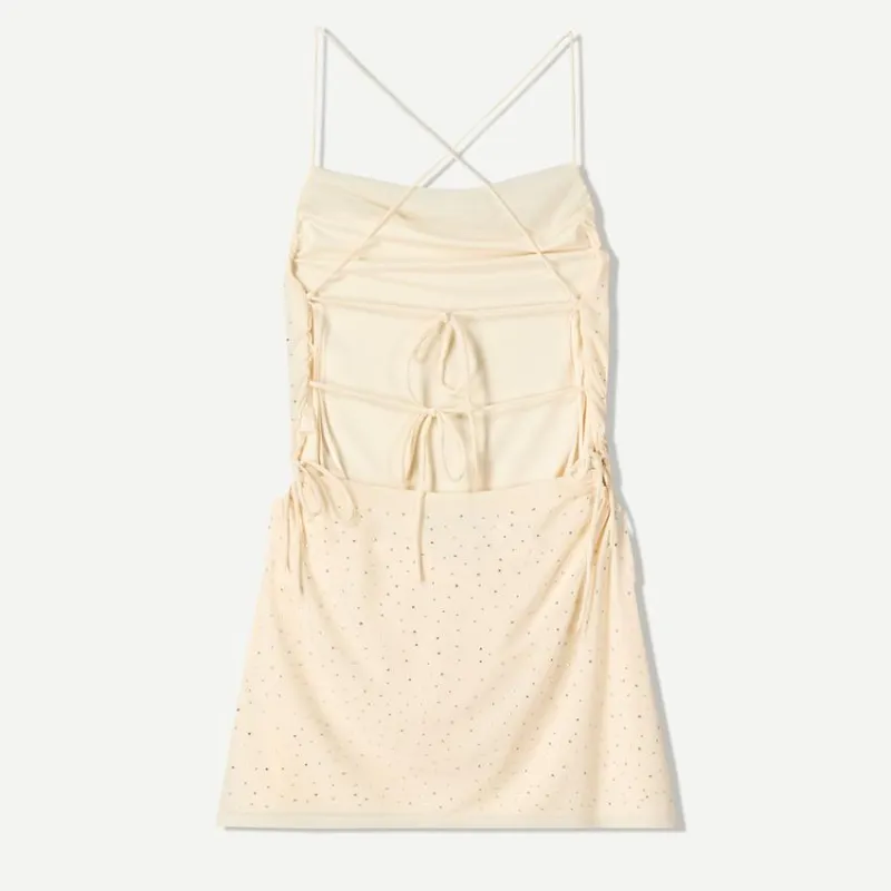 Vestido beige de perlas 