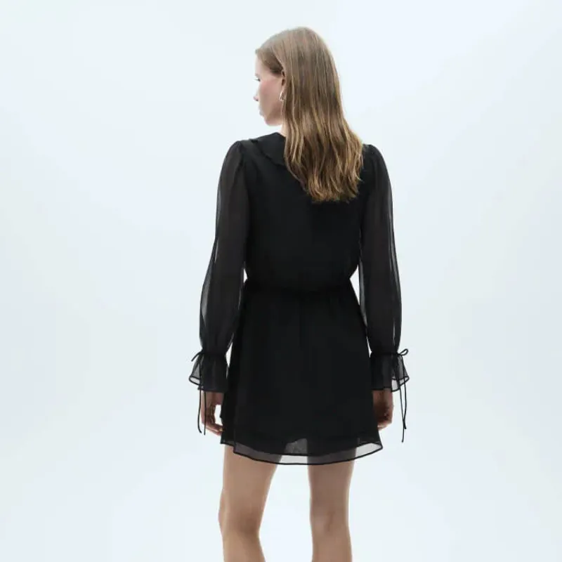 Vestido negro de mangas 