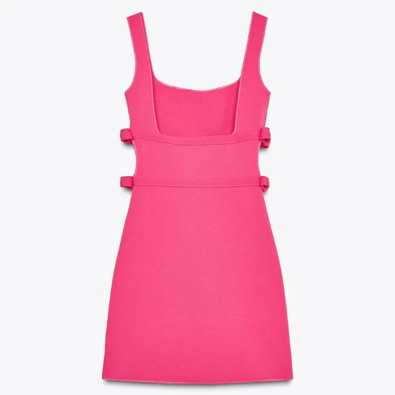 Vestido rosa de lazos 