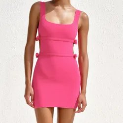 Vestido rosa de lazos 