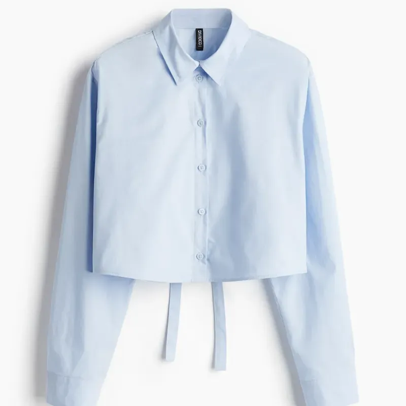 Blusa de mangas largas