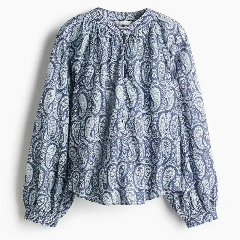 Blusa de mangas largas