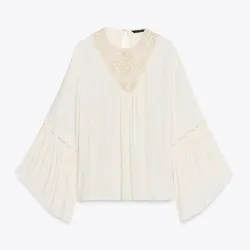 Blusa de mangas largas