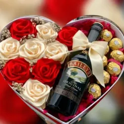 Corazón 8 ferreros +9 rosas eternas +botella de vino 