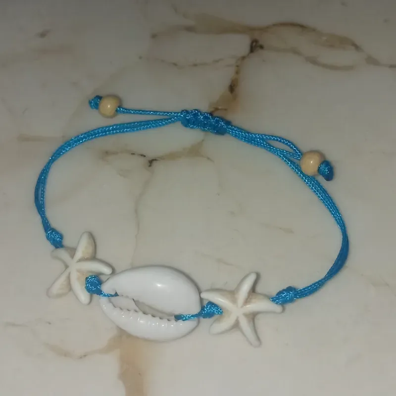 Pulsera de Hilo Chino con Estrellas y Caracol 