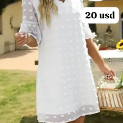 Vestido de mangas cortas y puntos 