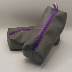 Cartuchera gris de vinil