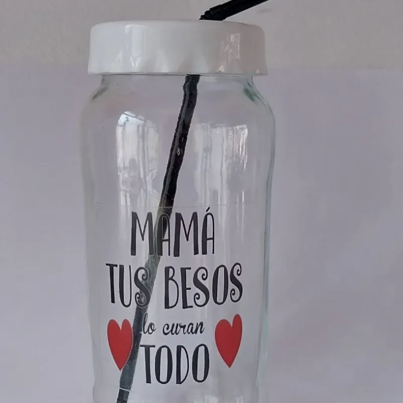 Pomo con frase, tapa y absorbente