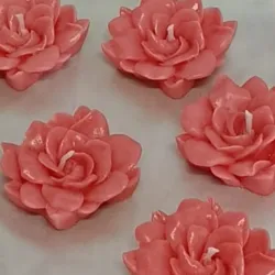 Vela rosa con aroma